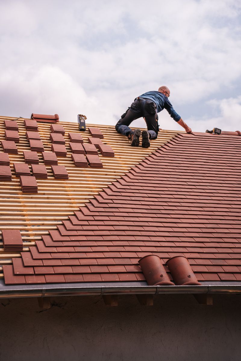 Roofer working on a residential roof
